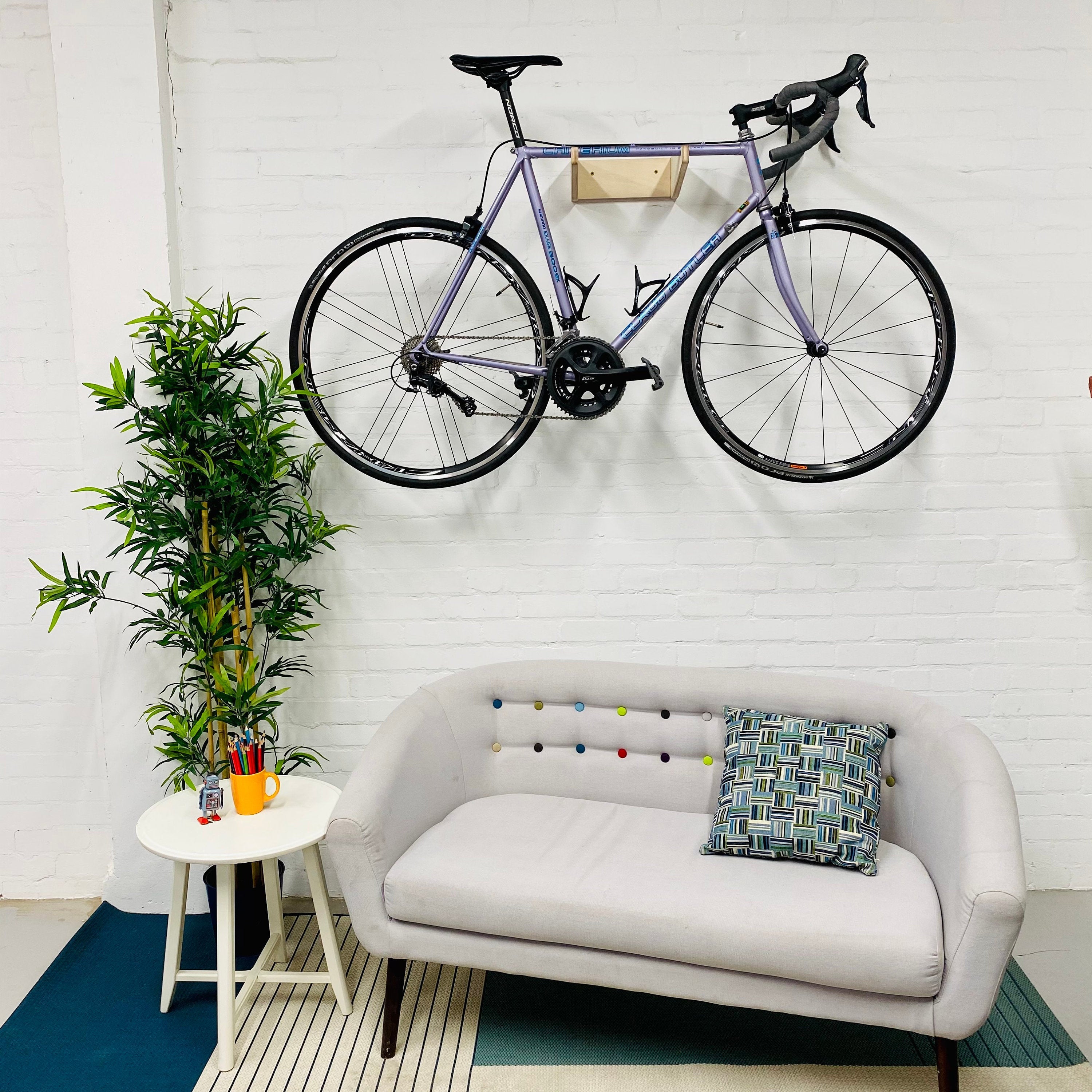 Wall mounted bike holder